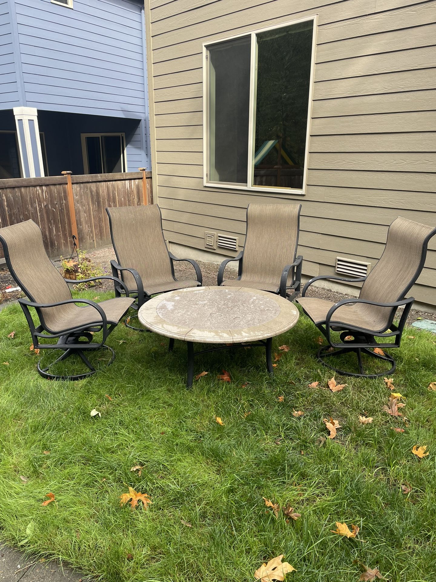 Tropitone Outdoor Table And 4 Swivel/Rocker Chairs