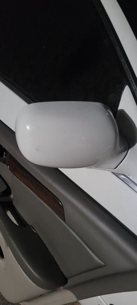 Right side mirror passenger side. Back door panels