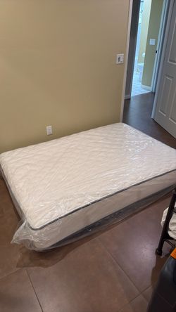 Full size mattress, metal platform and fabric grey headboard
