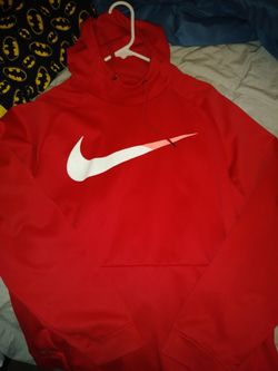 Nice gently used nike sweater. The end of the swoosh is orange. 15$