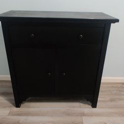 Title: Elegant Black Wooden Cabinet with Ample Storage