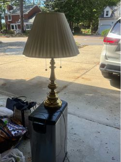 Lamp light and magazine holder