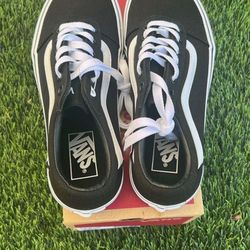 Black/White Vans 