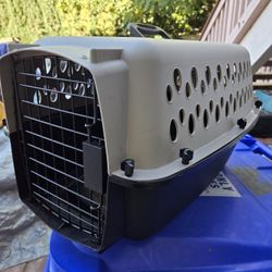 NEW PET CARRIER $20.00. MEDIUM