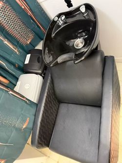 Professional salon shampoo chair with ceramic shampoo bowl.