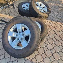RAM 1500  OEM Wheels And Blizzak Tires 