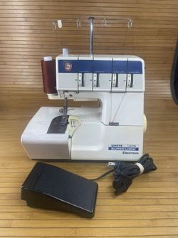 White 734DW Super Lock Serger Sewing Machine.
