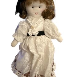 White rag doll that is 8” no original box or papers not sure the maker