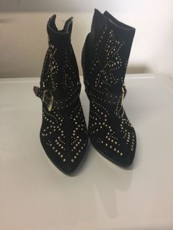 Black and gold boots