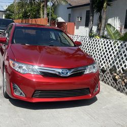 2102 toyota camry hybrid  Salvage 