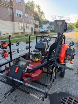Exmark Commercial Mower and Echo Landscaping Equipment Set
