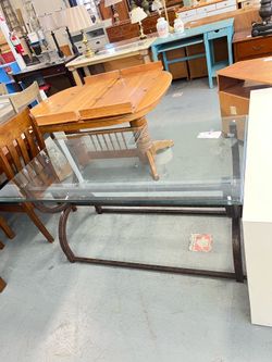 Glass top metal table made in Mexico (in store)