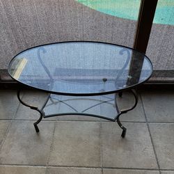 Glass and wrought iron coffee table