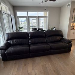 Dark Brown Leather Reclining Couch  (taking best offer)