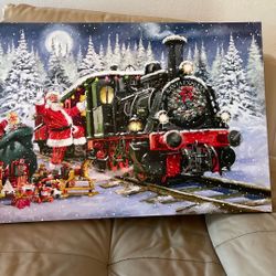 Santa With Train Lights Up New