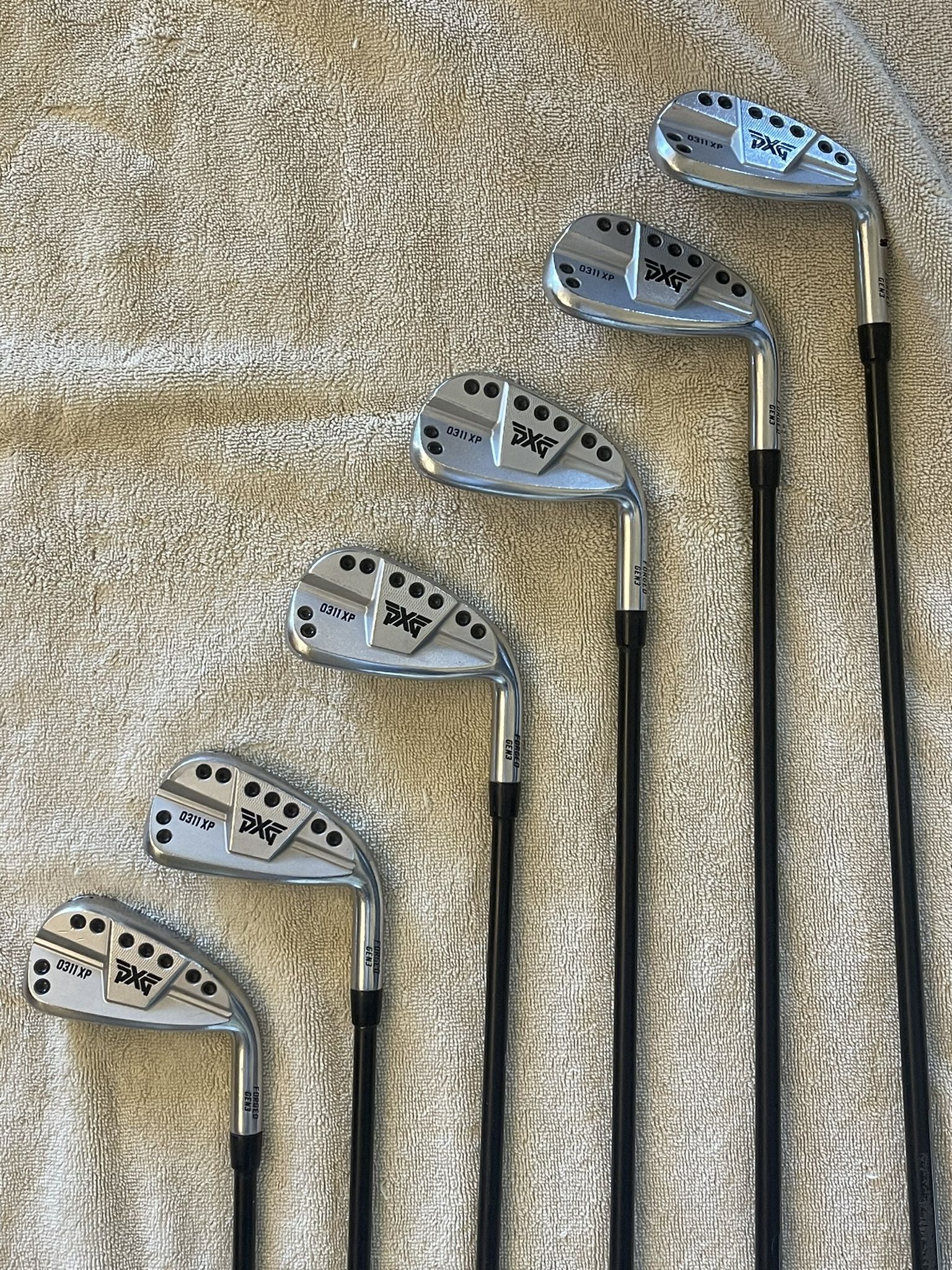 PXG Set of Irons with Graphite Shafts. 0311XP (6,7,8,9,PW,GW) 