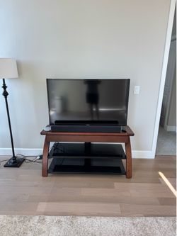Wood & Black Glass TV Stand with Built-In TV Mount