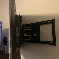 Tv mounting with stand