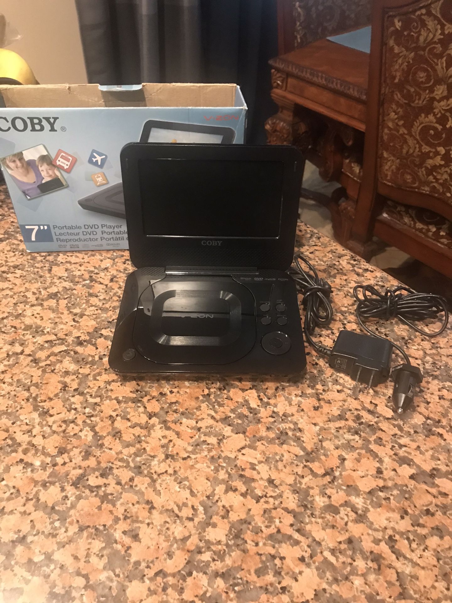 Used in great condition Coby brand Portable DVD player 7” comes with car charger and and home charger..