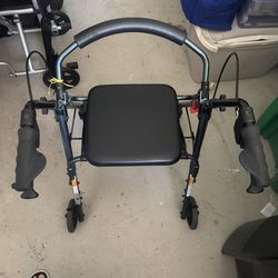 Walker with seat & storage $65