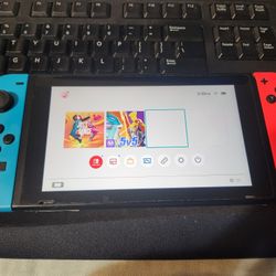 Nintendo Switch V1 (Blue & Red Neon Joycons)
