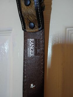 Ranger belt company 42 inch belt really nice looking belt with a special belt buckle and medallions all over the belt and sequins
