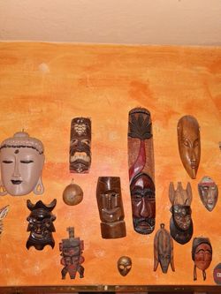 Collective Wooden Hanging Masks