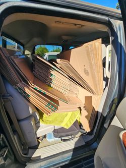 Moving boxes and wardrobe with hanger