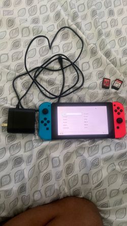 Nintendo Switch + 2 games