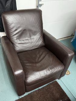 Brown Leather Natuzzi Recliner and Side Table