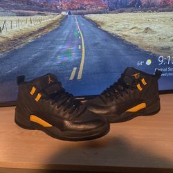 jordan 12 black taxi