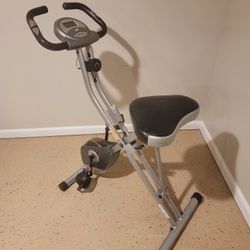 Exerpeutic Folding Stationary Exercise Bike with 8 levels of resistance.