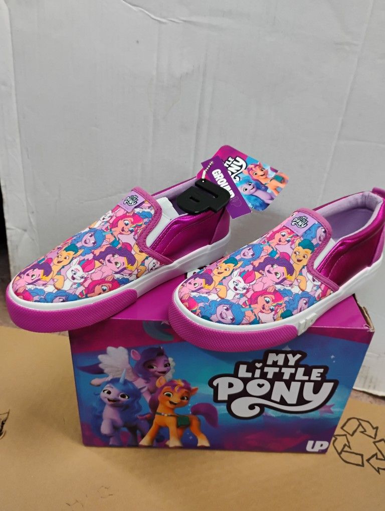 Ground Up My Little Pony slip-on toddler sneakers with a multi-character pattern and pink metallic trim. size 2