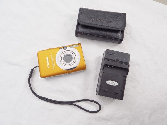 Canon PowerShot ELPH SD1200 IS Orange Digital Camera W/Battery & generic Charger