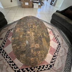 Previously Owned Granite Coffee Table With carved legs