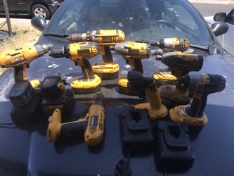 18v Dewalt 4 Drills 4 Impacts 1 Portable Battery Light and 2 chargers