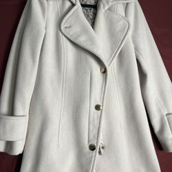 Calvin Klein beige coat zipper, and gold clamp Detail With Hidden Pockets  