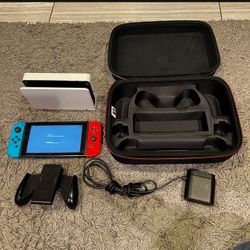 Nintendo Switch Red & Blue Version With Tv Dock, Cables And Carrying Case 