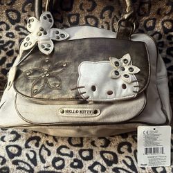 original rare 2007 sanrio hello kitty tan and brown purse 