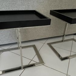 Two modern espresso and chrome end tables
