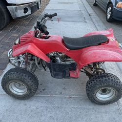 Quad For Kids 125cc Runs Great Jst Need Front Tires Plastic Are Good Jst A Lil Sun Faded 