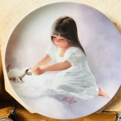 This is a 1985 "Tender Beginnings" collector plate from the Children & Pets collection, featuring artwork by Donald Zolan and produced by Pemberton & 