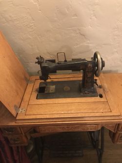 Beautiful antique sewing machine cum table with drawers