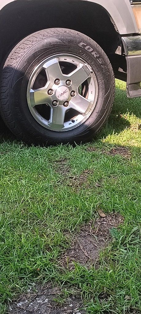 16inch GMC factory wheels and tires