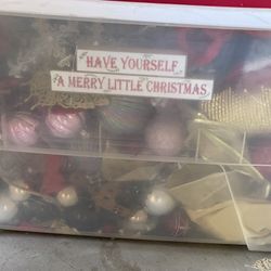Big plastic tub container with full of christmas stuff