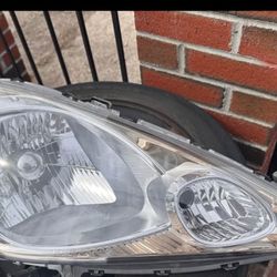 09-14 Honda Fit Passenger Chrome  Headlight 
