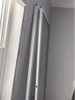 Sliding glass impact doors