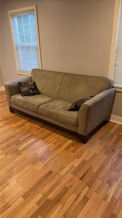 Beige Couch with Accent Pillows