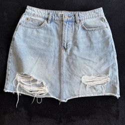 Size 29 Womens light blue ripped jeaned skirt