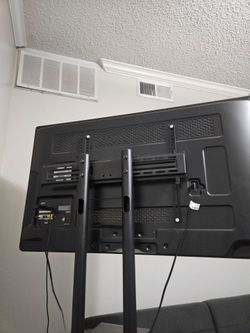 Older Samsung TV  42inch + heavy-duty rolling TV cart/stand — works — $80  OBO